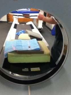 going through the CT scanner